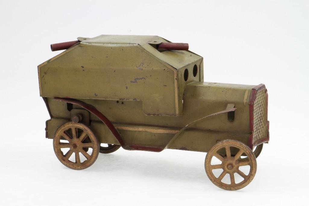 Hillclimber Armored Car: Dayton; Painted Pressed Steel, Friction Powered Dented Front Grill; Very Good Condition, 11"L Notes:Turner Auctions + Appraisals is pleased to feature the Anita & Sedwick Hellman Toy Collection. 