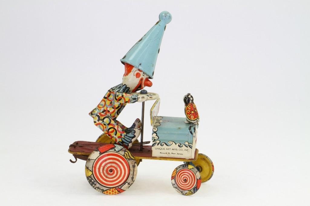 Artie Clown Car: Unique Art Co., Tin Litho Construction, Clockwork Activated, Colorful Action Toy, Needs Cleaning; Very Good Condition, 9 1/2"H x 7 1/4"L Notes:Turner Auctions + Appraisals is pleased to feat