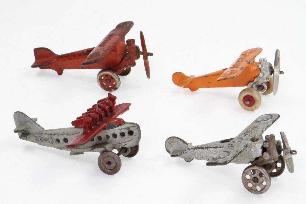 Lot of (4) Early Aircraft: Hubley; D0-X Flying Boat Plus (3) Rotary Engine Pieces; U X 99, Lucky Boy and Lindy; Painted Cast Iron, Nickel Engine/Landing Gear Struts; Good to Very Good Condition, 4 3/8" - 5"L Notes:Tur