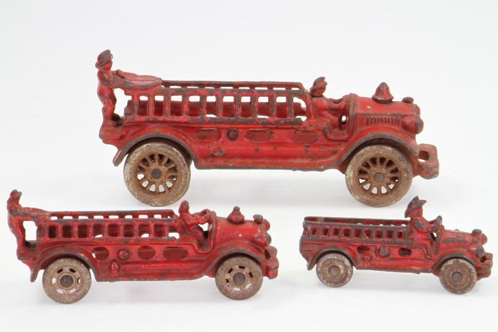 (3) Ladder Trucks: Makers Unknown; Painted Cast Iron, Nickel Wheels; Good Condition, 3 7/8" - 7 1/2"L Notes:Turner Auctions + Appraisals is pleased to feature the Anita & Sedwick Hellman Toy Collection. Offeri