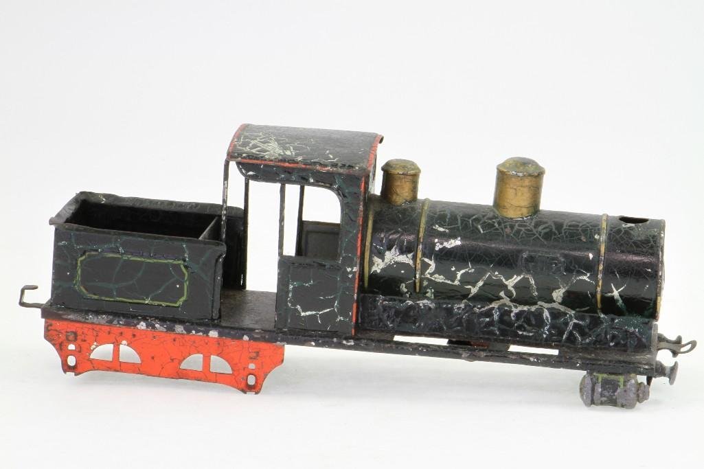 Steam Locomotive Body: Bing, hand painted, soldered tinplate construction, parts piece, 12"L Notes:Turner Auctions + Appraisals is pleased to feature the Anita & Sedwick Hellman Toy Collection. Offering over 245 l