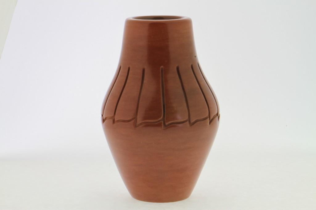 Santa Clara carved redware vase: Toni and Jeffrey Roller Height: 7 1/2 inches Provenance: Turner Auctions + Appraisals is pleased to offer the library and selected artifacts from the personal collection of Jim Haas, the noted, long-t