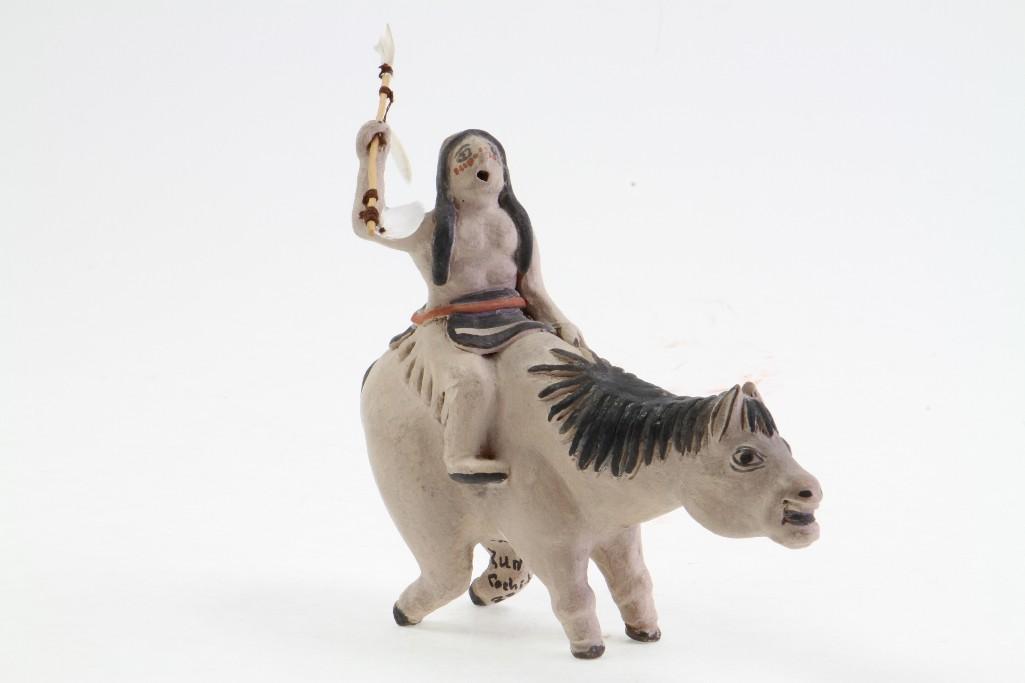 Zuni/Cochiti equestrian figure: Lambert Eustace Length: 5 3/4 inches Provenance: Turner Auctions + Appraisals is pleased to offer the library and selected artifacts from the personal collection of Jim Haas, the noted, long-time spec