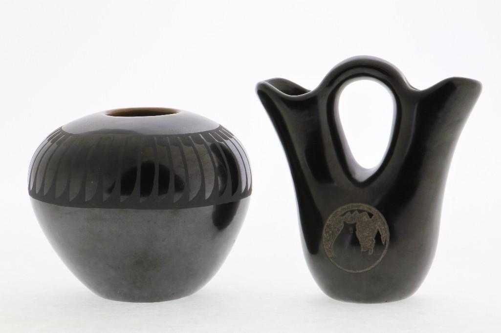 Two Pueblo blackware vessels: A seed jar, Santana and Adam, San Ildefonso, and a wedding jar, Golden Rod (Gloria Garcia), Santa Clara Tallest example height: 5 1/2 inches Provenance: Turner Auctions + Appraisals is pleased to offe
