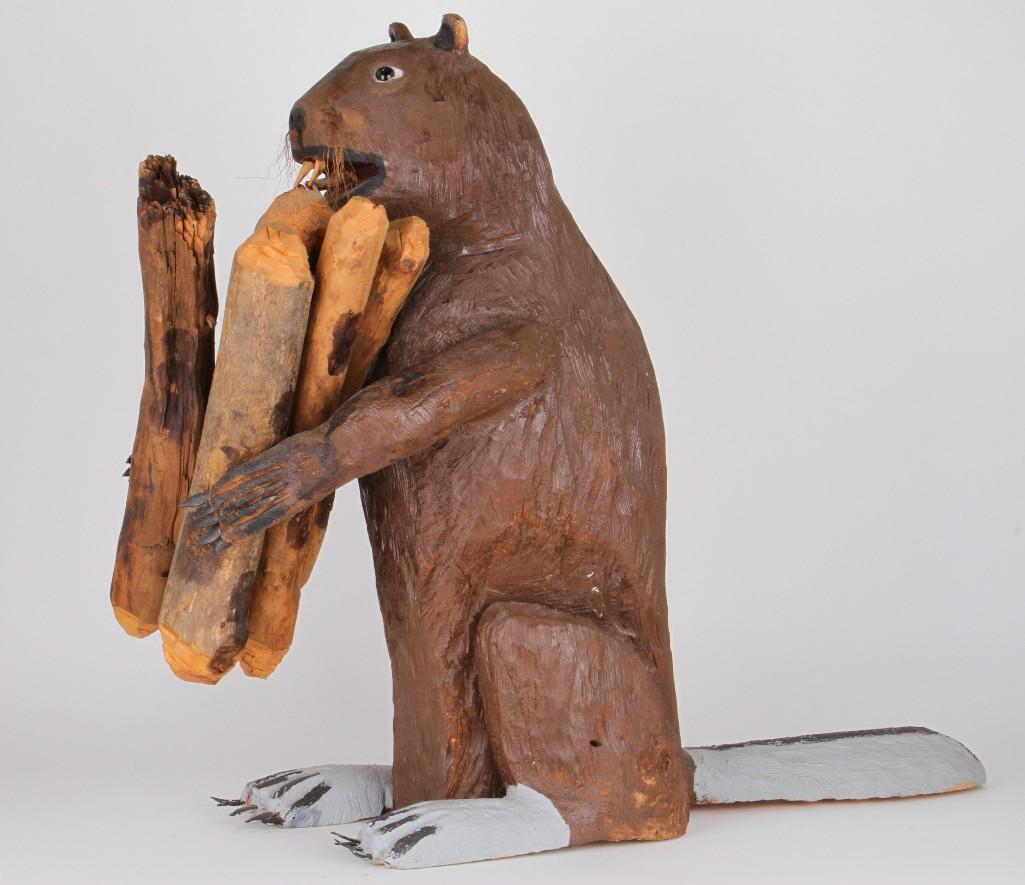 New Mexican folk art carving of a beaver: Felipe Benito Archuleta Height: 23 1/2 inches Provenance: Turner Auctions + Appraisals is pleased to offer the library and selected artifacts from the personal collection of Jim Haas, the noted, long-