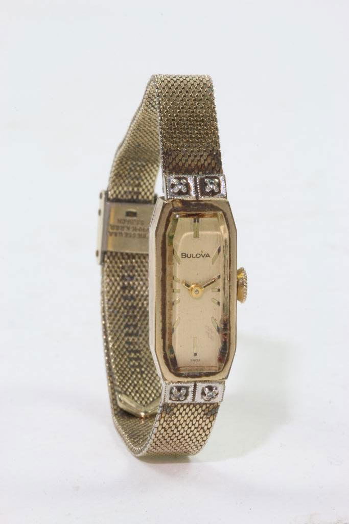 VINTAGE BULOVA LADIES WATCH: VINTAGE BULOVA LADIES 10K WATCH Notes:This "Fine Mélange" comes from numerous sources and estates. Here are just some of items this sale includes: charming Steiff animals (over 40 lots of almost 150