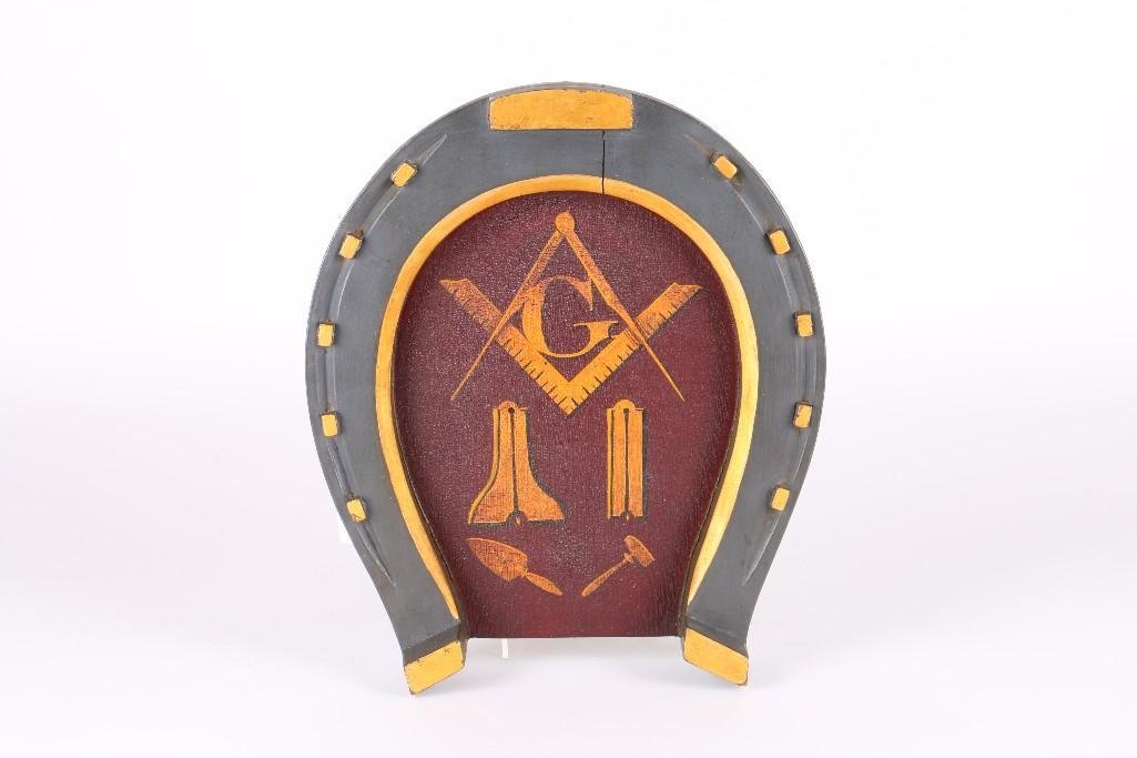FOLK ART BLACKSMITH'S MASONIC HORSESHOE TRADE SIGN: FIRST HALF 20TH CENTURY. HEIGHT 13 INCHES, WIDTH 11 INCHES, DEPTH 2 3/8 INCHES. Notes:This "Fine Mélange" comes from numerous sources and estates. Here are just some of items this sale inc
