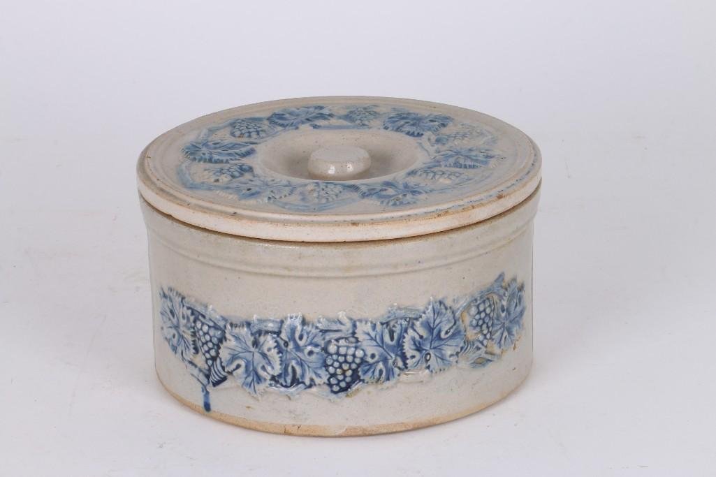 ADVERTISING FLOW BLUE CROCK: FRIEDMAN, SAN FRANCISCO: FLOW BLUE STONEWARE RELIEF MOLDED WITH GRAPE TRELLIS, STAMPED "MADE IN GERMANY FOR M. FRIEDMAN & CO., 237 POST ST., SAN FRANCISCO. THE BIGGEST FURNITURE HOUSE ON THE PACIFIC COAST'. HEIGHT 4 