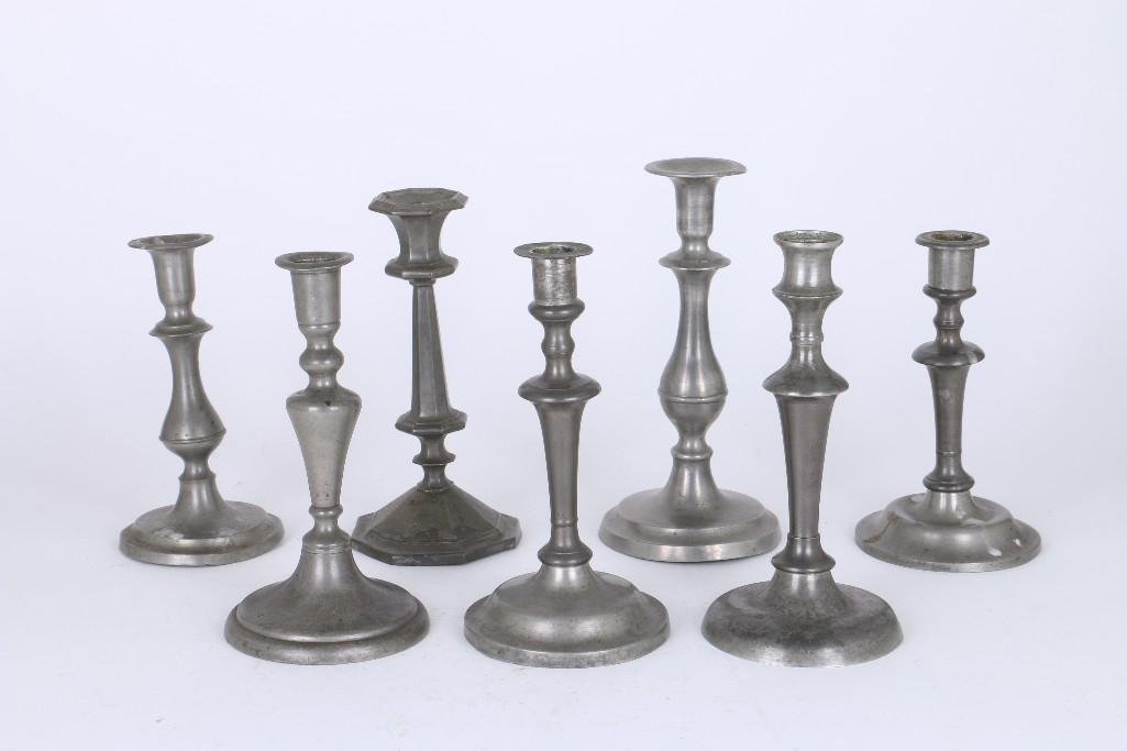 SEVEN VARIOUS PEWTER CANDLESTICKS: 19TH CENTURY, HEIGHTS BETWEEN 8 & 10 INCHES. Notes:This "Fine Mélange" comes from numerous sources and estates. Here are just some of items this sale includes: charming Steiff animals (over 40 lo