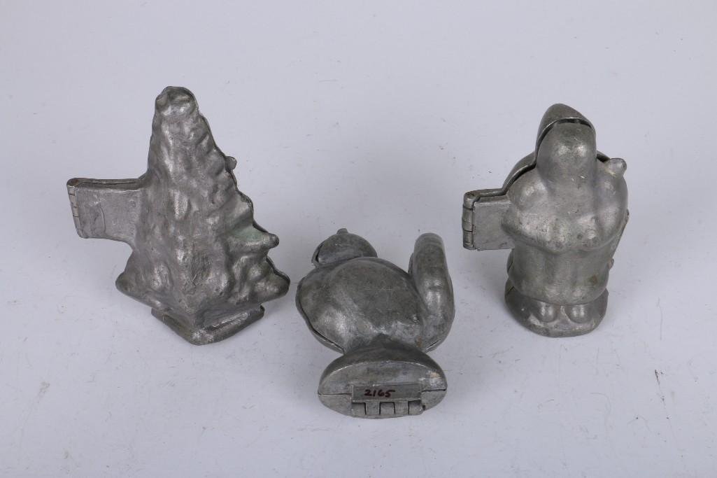 4 EPPELHEIMER PEWTER HOLIDAY THEMED ICE CREAM MOLDS: A. #1154, CHRISTMAS TREE, B. #991, SANTA CLAUS,