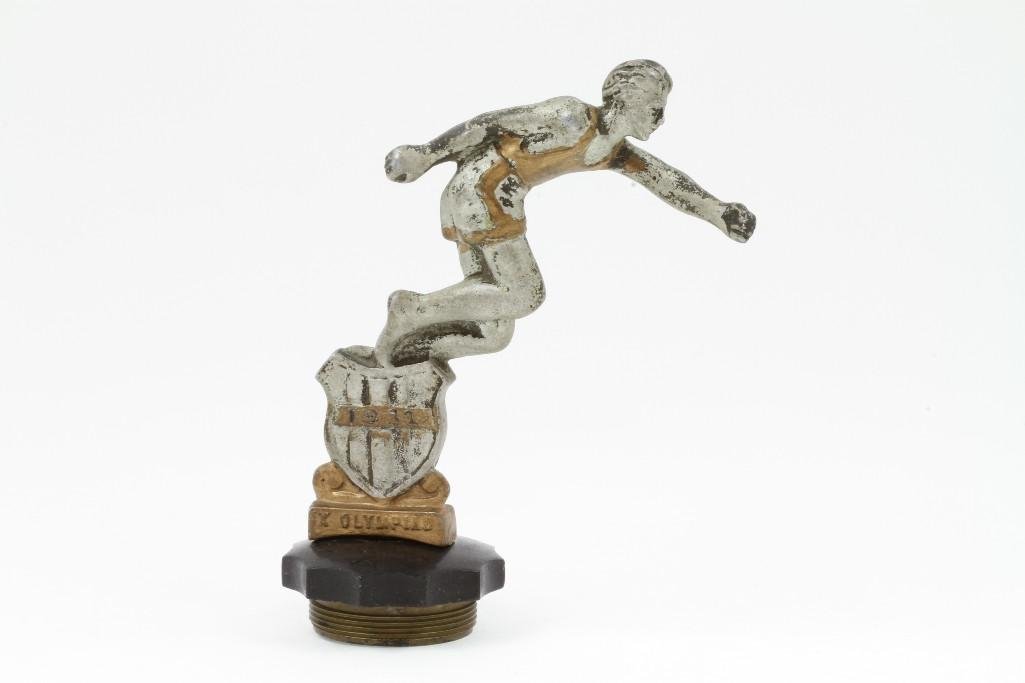 Xth OLYMPIAD RUNNER MASCOT: Height: 7 1/4 inches Notes:This "Fine Mélange" comes from numerous sources and estates. Here are just some of items this sale includes: charming Steiff animals (over 40 lots of almost 150 items), Lou