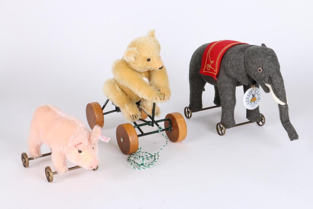 THREE STEIFF ROLLING ANIMALS: Three Steiff rolling animals Notes:This "Fine Mélange" comes from numerous sources and estates. Here are just some of items this sale includes: charming Steiff animals (over 40 lots of almost 150 ite