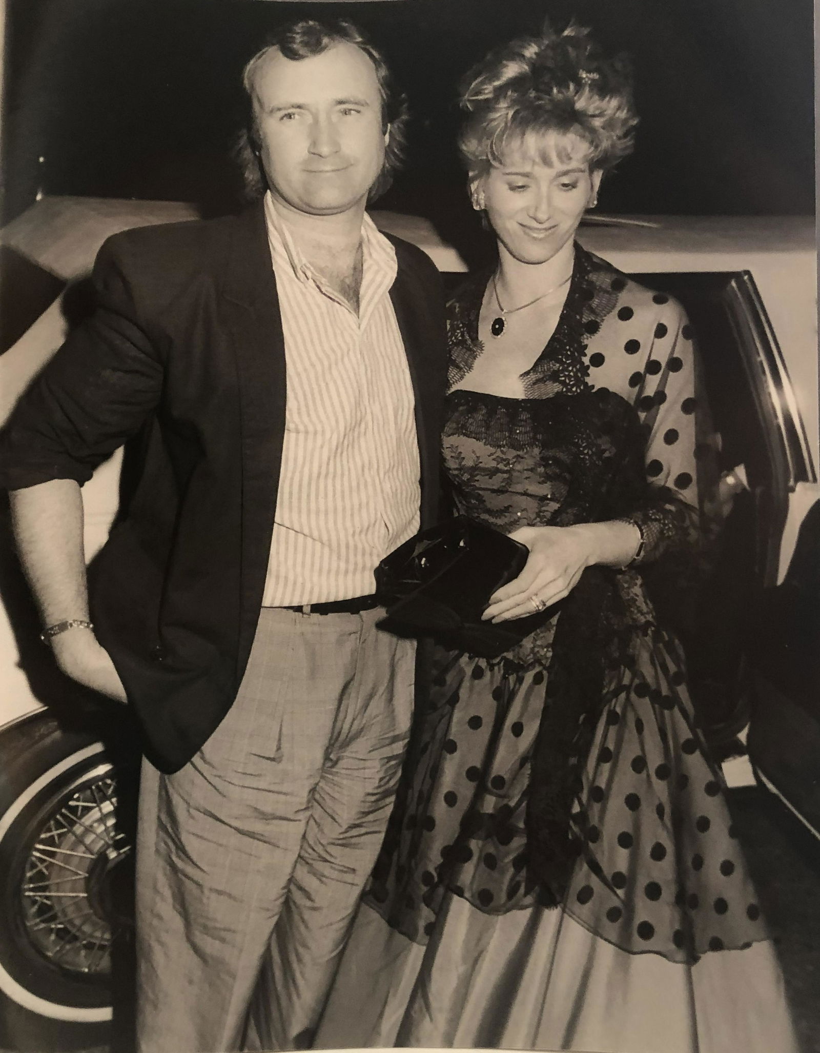 Phil Collins and wife Jill 1986 original photo by Scott: Phil Collins and wife, Jill at the party hosted by Atlantic Records at the Mr. Chow Restaurant in Beverly Hills after he won three Grammy's at the 28th Annual Grammy Awards. Taken by noted photographe