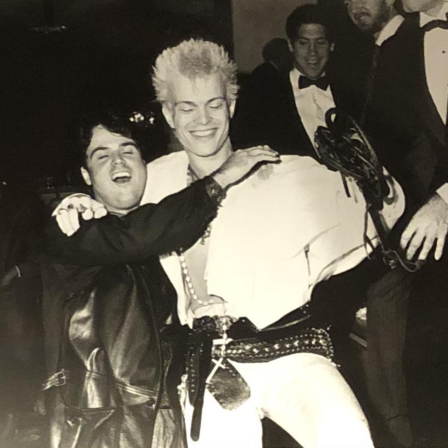 Billy Idol and Donny Osmond at the Beverly Wilshire: Billy Idol at the Beverly Wilshire Hotel for ASCAP Awards dinner stops to show singer Donny Osmond his whip. Photographer stamps verso and description. Original phot on kodak paper. Photo taken by not