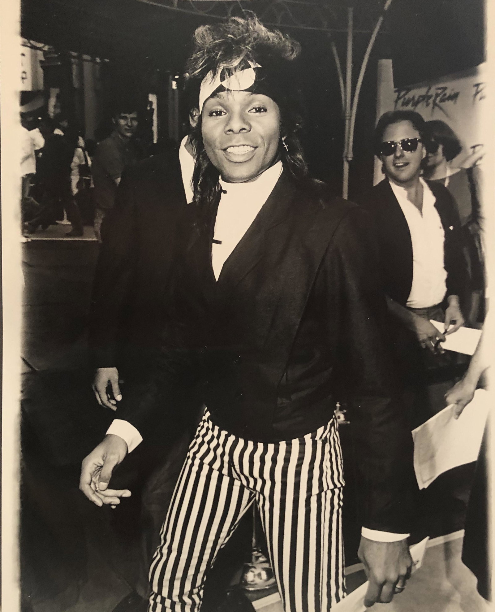Prince Guitarist premier of Purple Rain - photographers: The Guitarist of the rock group PRINCE at the Premiere of the new move, Purple Rain, at Manns Chinese Theatre in Hollywood. Taken July 26, 1984 by noted photographer Steve Granitz w/ photographer stam