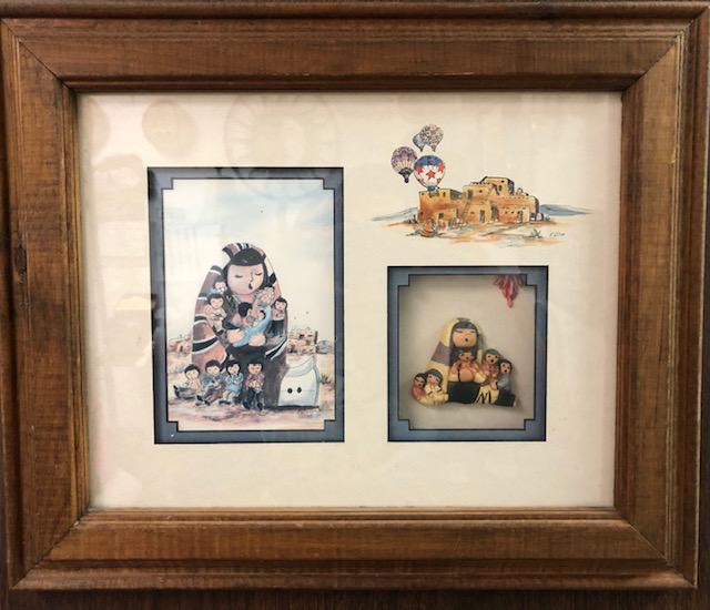 Storyteller Dolls by Laverne Elliott: 15"x 18" frame. The Storyteller figure surrounded by children represent an important member of the pueblo community. Laverne Elliott, a native New Mexican of Cherokee and Scotch-Irish decent, has been