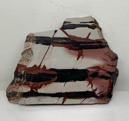 Picture Jasper: Measurements: 5" x 3.5" x 1". Weight: 13.9 oz. Picture Jasper is an opaque, microcrystalline variety of Quartz with extraordinary color banding, veining and depositional flow patterns created by petri