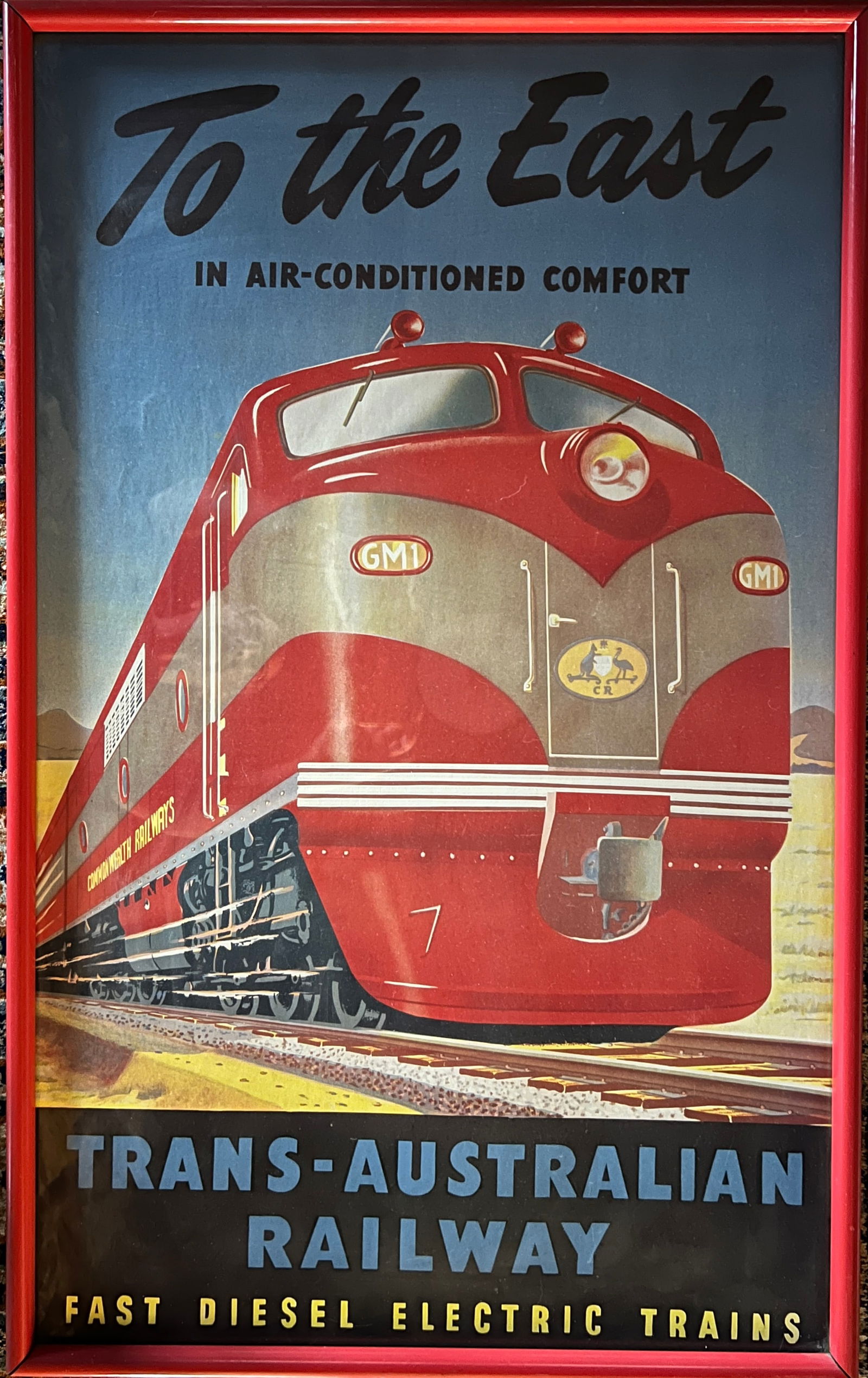 Trans Australian Railway-To The East-Rare 1950's Lithograph: Trans - Australian Railway " To The East " ORIGINAL and RARE 1950's LITHOGRAPH. Circa 1951. In a red vintage frame. 34 3/4 x 21 3/4