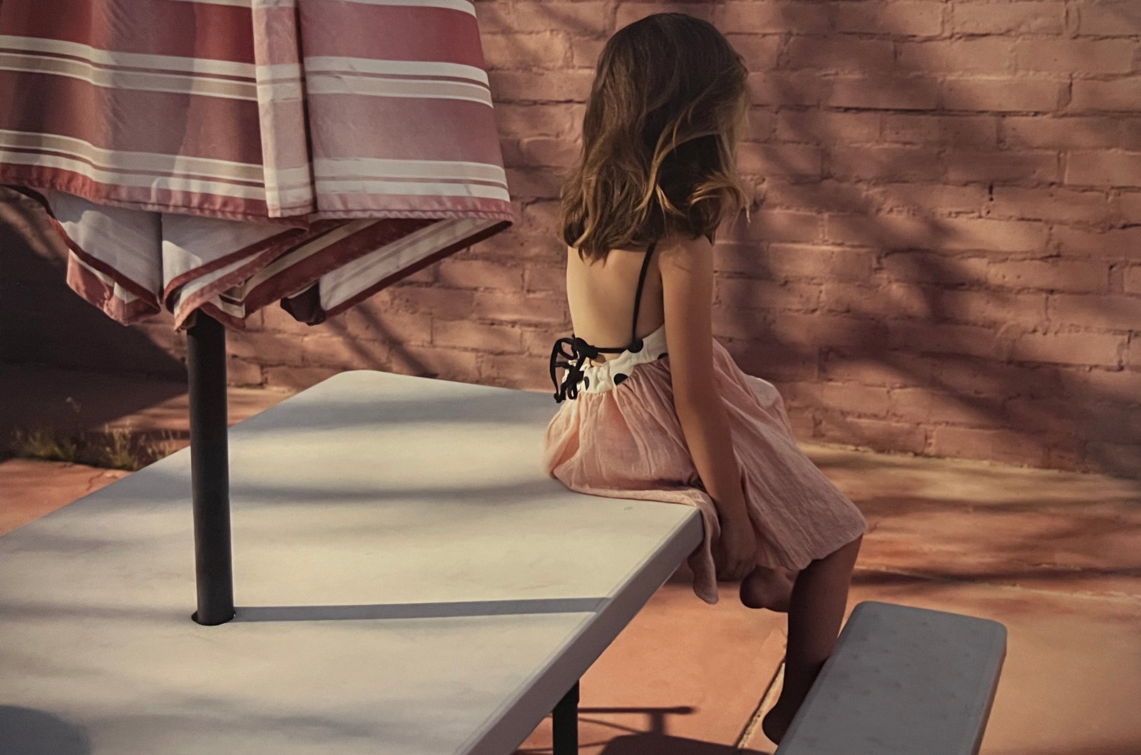 Rene & Radka Limited Edition AP print- Young girl sitting on a picnic table (1 of 2)