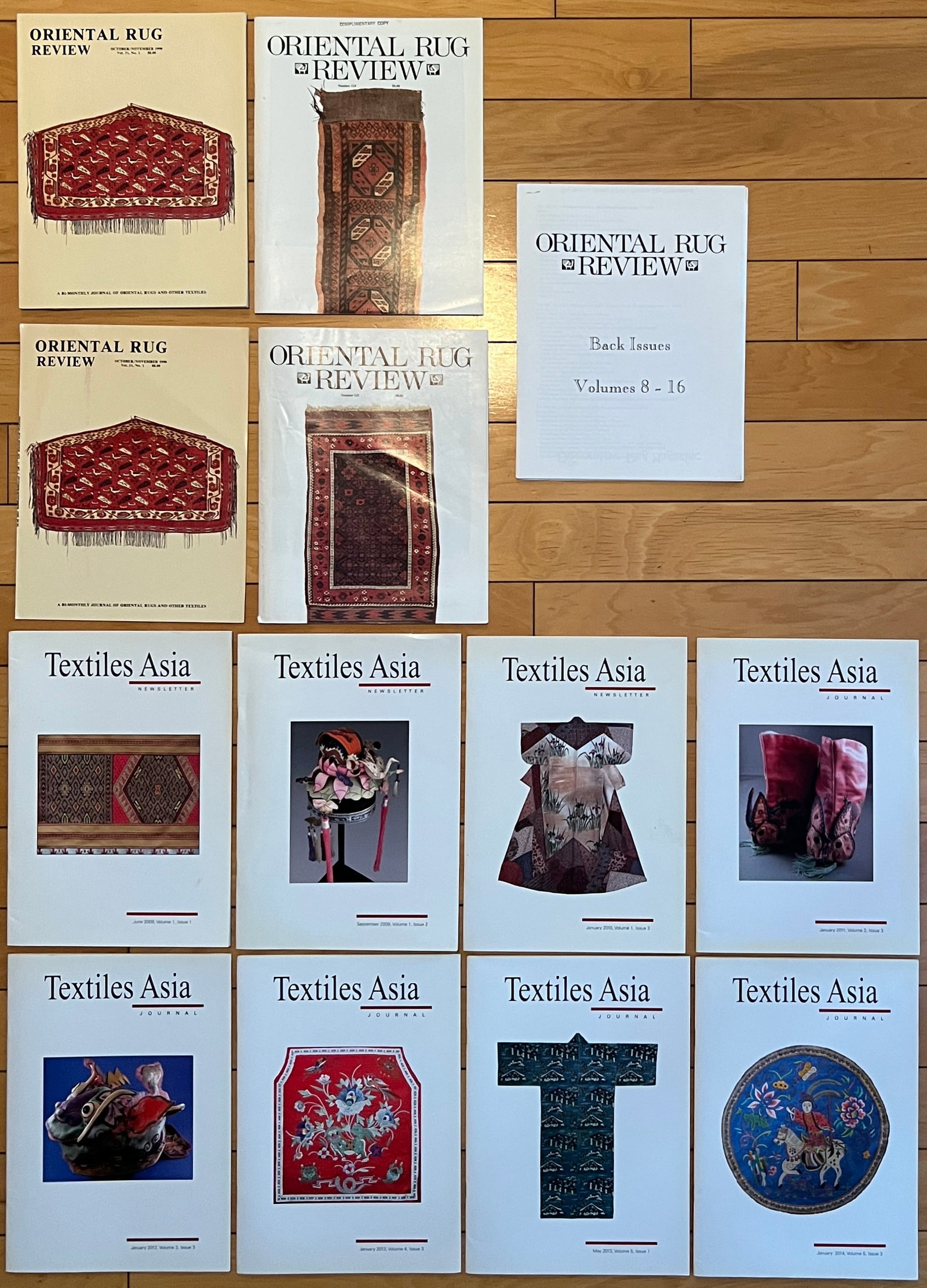 Textiles Asia Journal- 8 issues + Oriental Rug Review-12 item lot: Textiles Asia Journal- 8 issues + Oriental Rug Review-12 item lot (1 item in the pic is just a cover from Oriental Rug Review) incl 8 issues of Textiles Asia Review. This was publishe 3x per year.