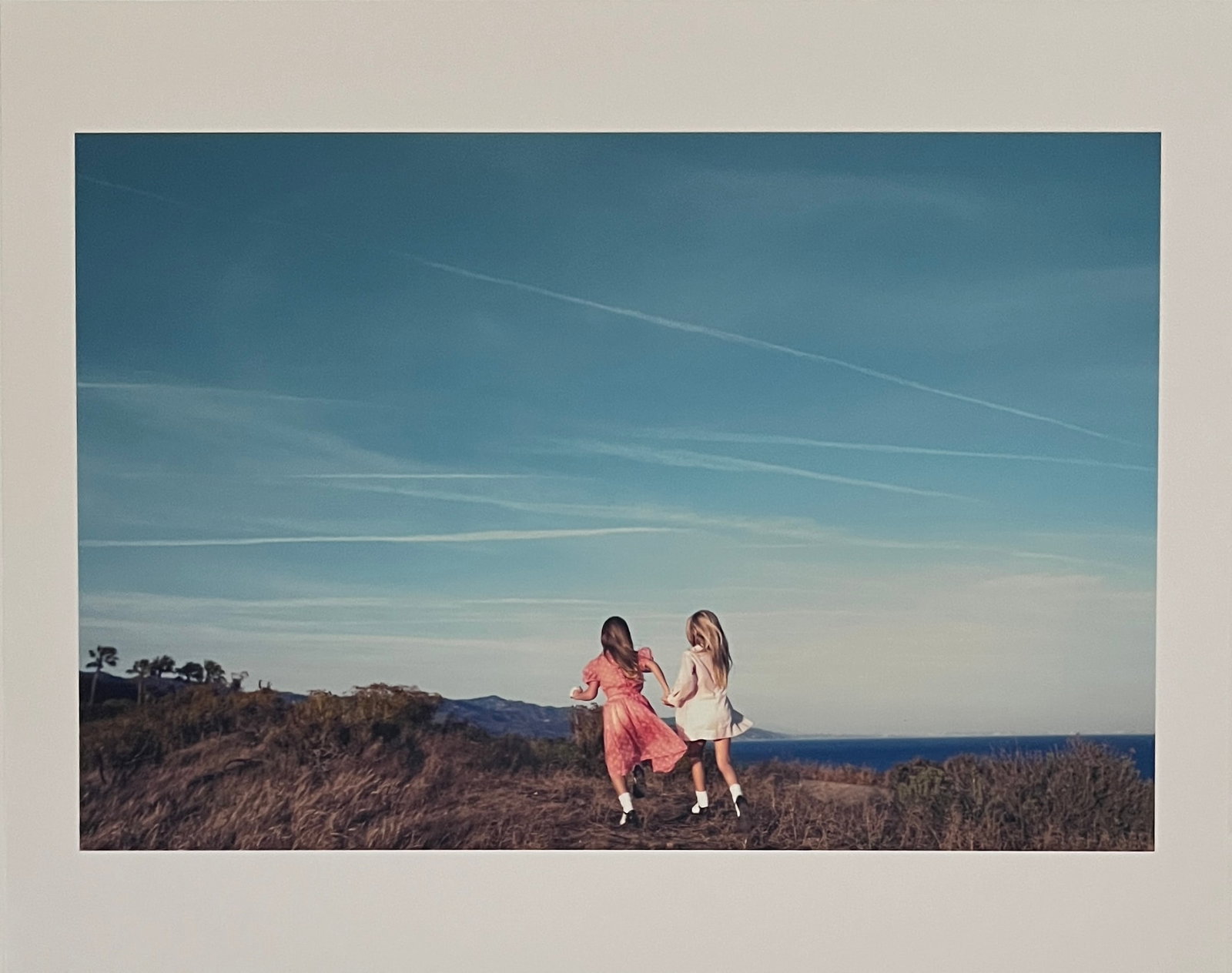 Rene & Radka-limited edition AP print - two girls running in meadow w ocean view (1 of 2)