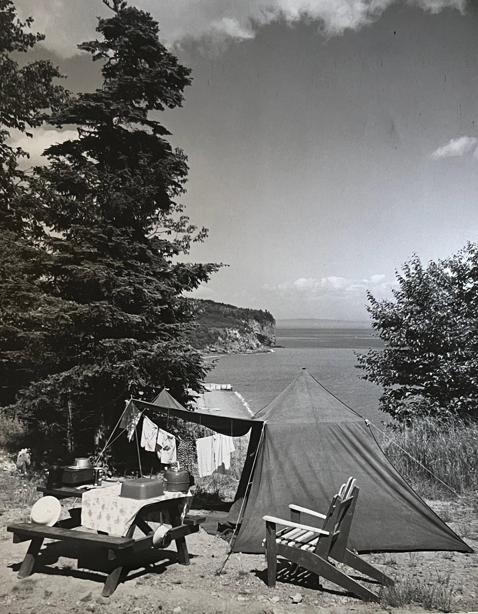 Marguerite Baker Johnson - Mid Century Photograph- Prominent Americana Photographer. Camping by: Photographer : Marguerite Baker Johnson. Black and white Vintage Mid Century Photograph. Dimensions: 9.5 x 7.5 Stamped Verso. Johnson was a native of Brussles Belgium and was a noted female photograph