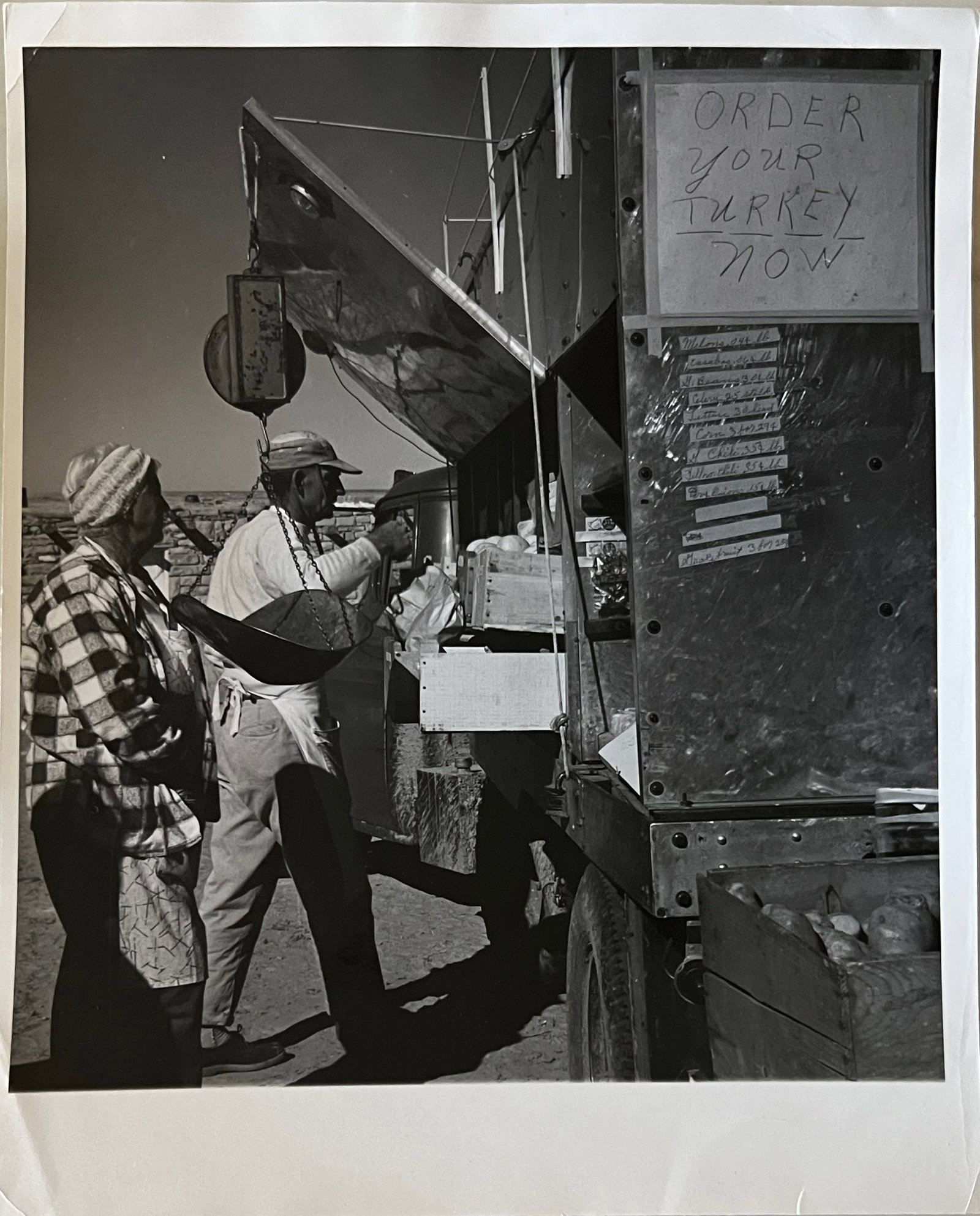 Marguerite Baker Johnson - Mid Century Photograph- Prominent Americana Photographer. Fruit Truck -: Photographer : Marguerite Baker Johnson. Black and white Vintage Mid Century Photograph. Dimensions: 10 x 8". Signed Verso. Johnson was a native of Brussles Belgium and was a noted female photographer