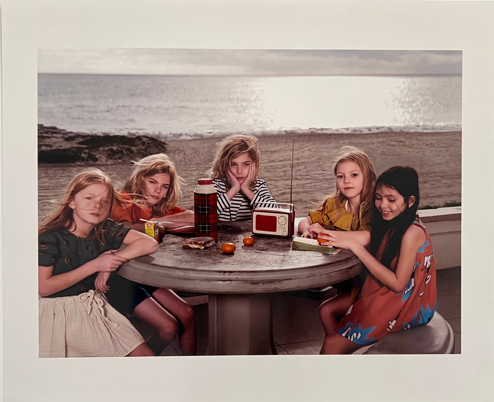 Rene & Radka -photograph - limited edition proof. Five girls around a table by the ocean (1 of 1)