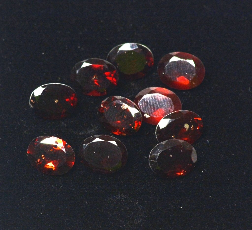 GLA Ten Piece Of Almendite Garnet: Ten piece of almendite garnet total 21.05 carats.see GLA report for more detail.