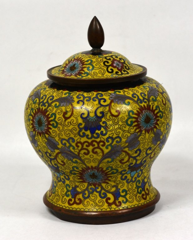 Chinese enamel cloisonne lidded jars: f Chinese enamel cloisonne lidded jars, the body decorated with lotus blossoms, trailing vines, and ruyi and petal lappet bands.size:9'x61/2' inch
