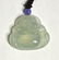 A Chinese Carved Natural Ice Green Jdeite Jade Pendant