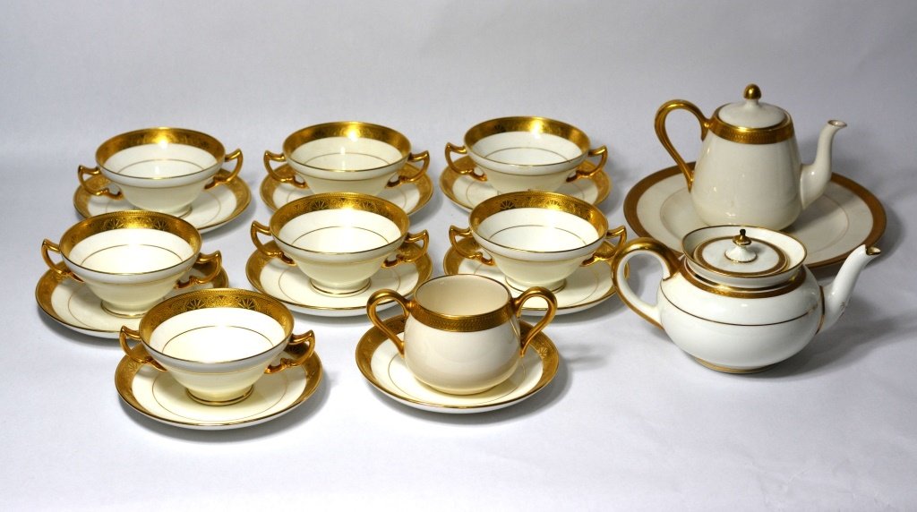19 Piece Plummer,Tiffany & Co.Porcelain Tea Set: 18 Piece Tiffany & company Procelain tea set , seven tea cup(5 1/4'x2 1/4') inch with seven tea cup holder plate(5 1/4' inch)one sugar cup (5 1/4' x2 1/2' inch)with holder plater 5 1/4' inch, one crea