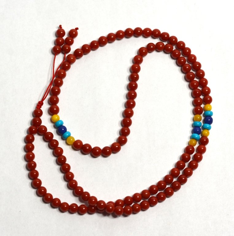 Natural Coral Nacklace or 3 Round Bracelet: One hundred seventeen natural coral beans nacklace or 3 round bracelet with lapis beans and butterscotch.