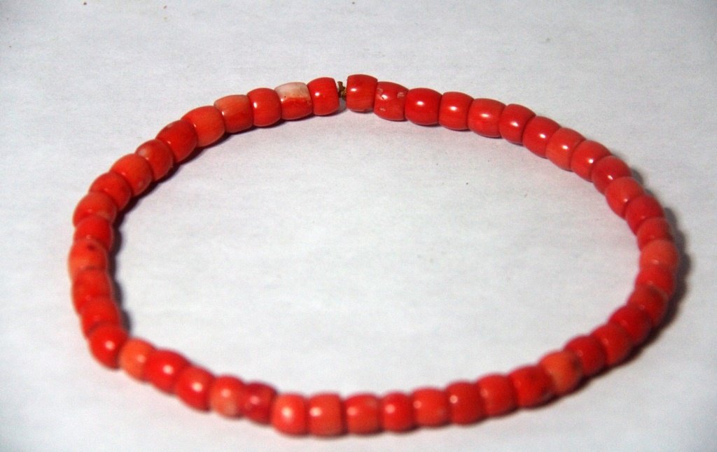 Natural Color Coral Necklace: Fourty-eight beans Natural Color Coral Necklace.