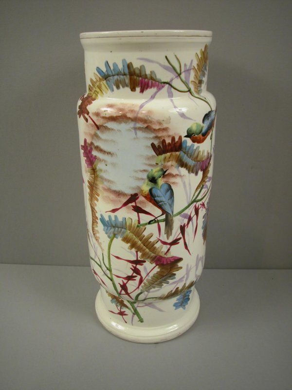 Majolica style umbrella stand with birds and ferns: Majolica style umbrella stand with birds and ferns painted on sides, hairline to base, 22"
