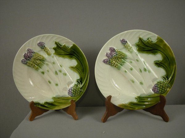Pair of French Salins majolica asparagus and artic: Pair of French Salins majolica asparagus and artichoke plates, 9 1/4"