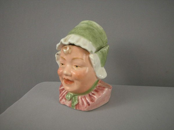 Majolica humidor of baby with green bonnet, 5", re: Majolica humidor of baby with green bonnet, 5", ref: Horowitz p. 42, #170