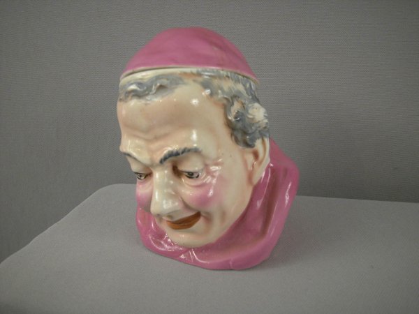 Royal Art Pottery humidor of monk with pink hat an: Royal Art Pottery humidor of monk with pink hat and robe, 6"