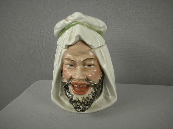 Majolica Arab man with white head dress humidor, 6: Majolica Arab man with white head dress humidor, 6", base rim nick