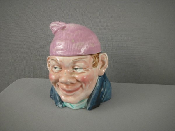 Majolica humidor of man with pink cap and blue coa: Majolica humidor of man with pink cap and blue coat, 5"