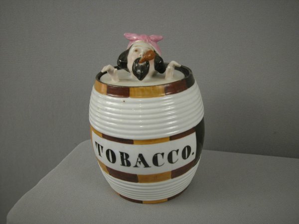 Porcelain tobacco barrel humidor with man with pip: Porcelain tobacco barrel humidor with man with pipe on lid, 6"