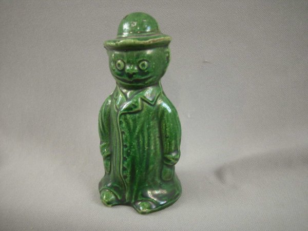 Dark green many with trench coat and hat still ban: Dark green many with trench coat and hat still bank, 5 1/2"
