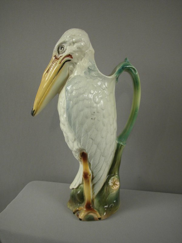 ST. CLEMENT rare marabou stork figural pitcher, 14: ST. CLEMENT rare marabou stork figural pitcher, 14", ref: Cunningham p. 97, professional repair to beak