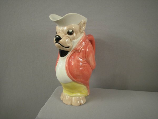 SARREGUEMINES full figural bull dog pitcher with r: SARREGUEMINES full figural bull dog pitcher with red jacket, professional rim chip repair, very rare form, #4685, 9 3/4"