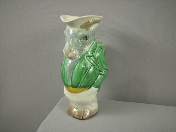 SARREGUEMINES rare form full figure ram pitcher wi: SARREGUEMINES rare form full figure ram pitcher with green jacket, #4688, very rare form, 9 3/4", minor rim glaze nick