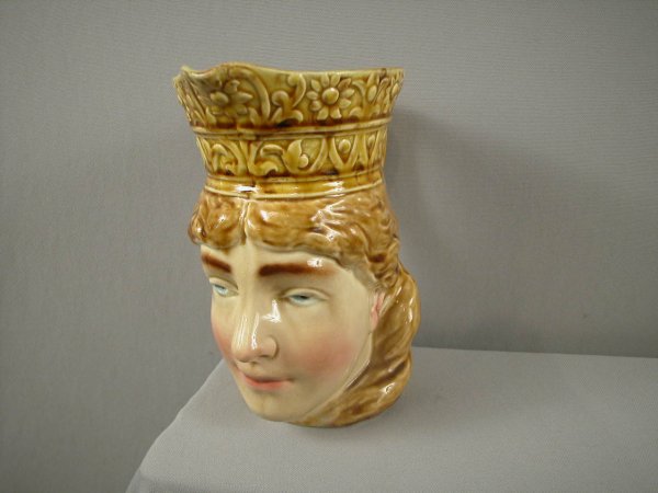 SARREGUEMINES figural face jug #3331, "Norwegian L: SARREGUEMINES figural face jug #3331, "Norwegian Lady with Crown", 8 1/4", ref: Cunningham p. 69, hairline to base