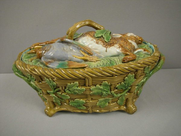 MINTON majolica game dish with basket weave base w: MINTON majolica game dish with basket weave base with oak leaves and acorns and lid with rabbit and birds on bed of leaves and ferns in high relief, 15"l, minor hairline to base