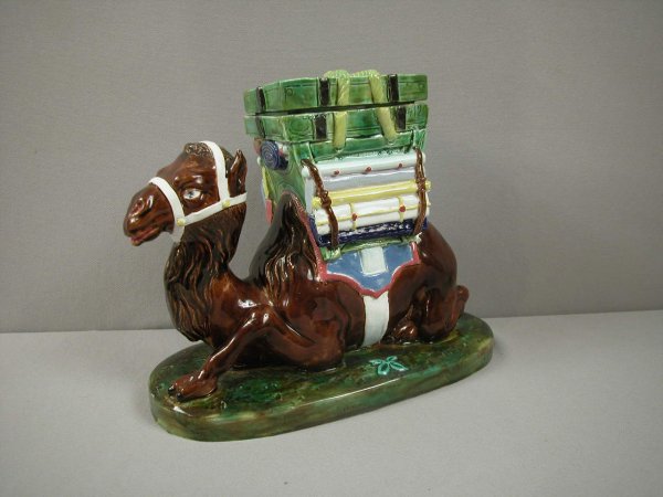 HOLDCROFT large camel figural tobacco humidor, 11": HOLDCROFT large camel figural tobacco humidor, 11"l, 8 1/2"h rare form, professional repair to lid and rim of crate, nick to camel's ear