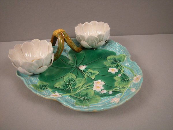 GEORGE JONES majolica strawberry server with pond: GEORGE JONES majolica strawberry server with pond lily leaf and strawberry flowers on basket base and water lily floral cup cream and sugar with vine handle, great color, 10", professional repair to l