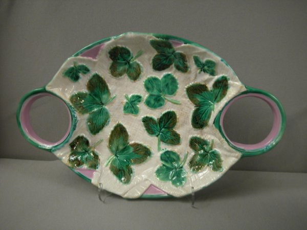 GEORGE JONES majolica napkin strawberry platter wi: GEORGE JONES majolica napkin strawberry platter with fitted holes for creamer and sugar, lacking, 14"